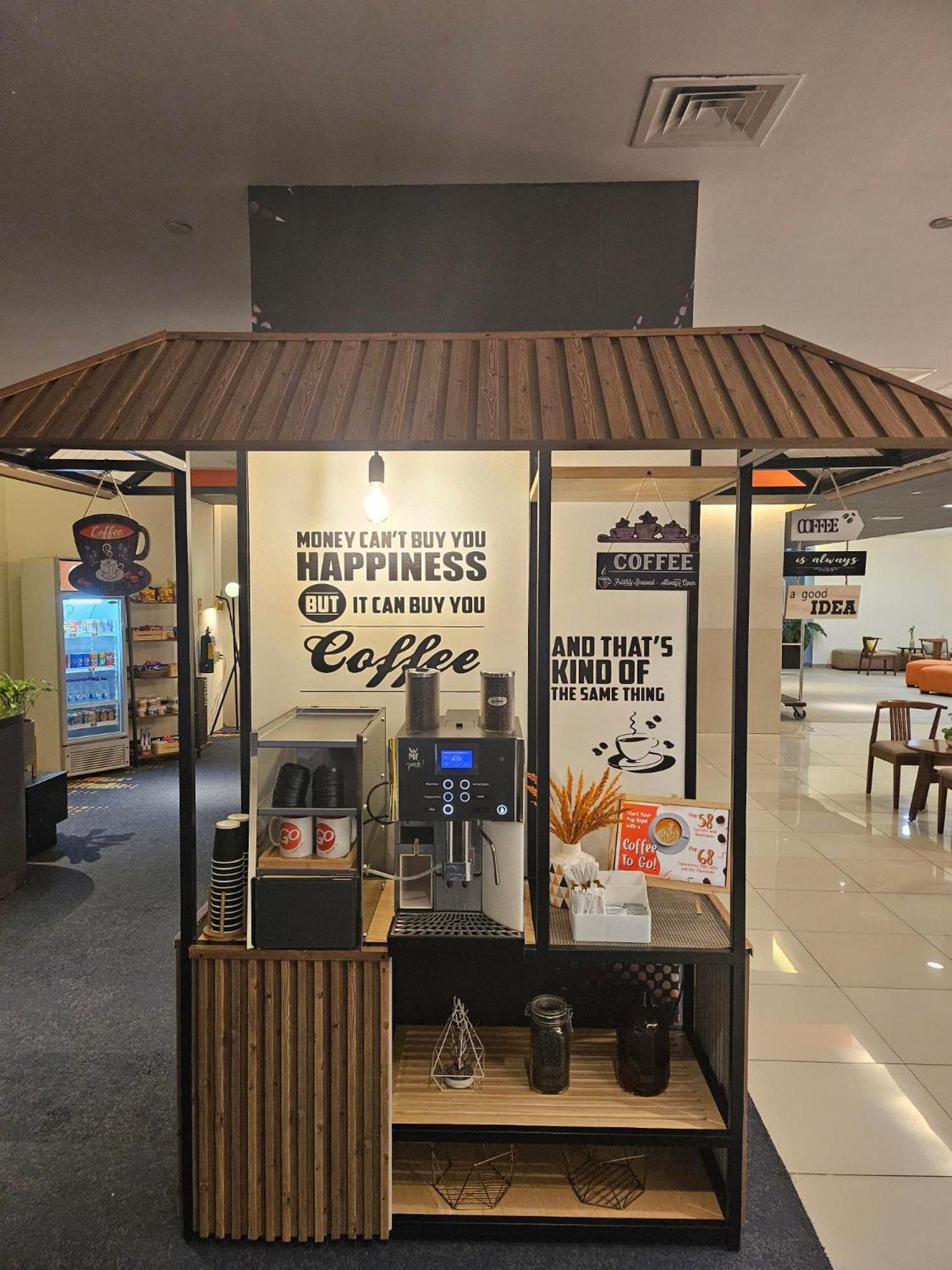曼达卢永出发酒店 外观 照片